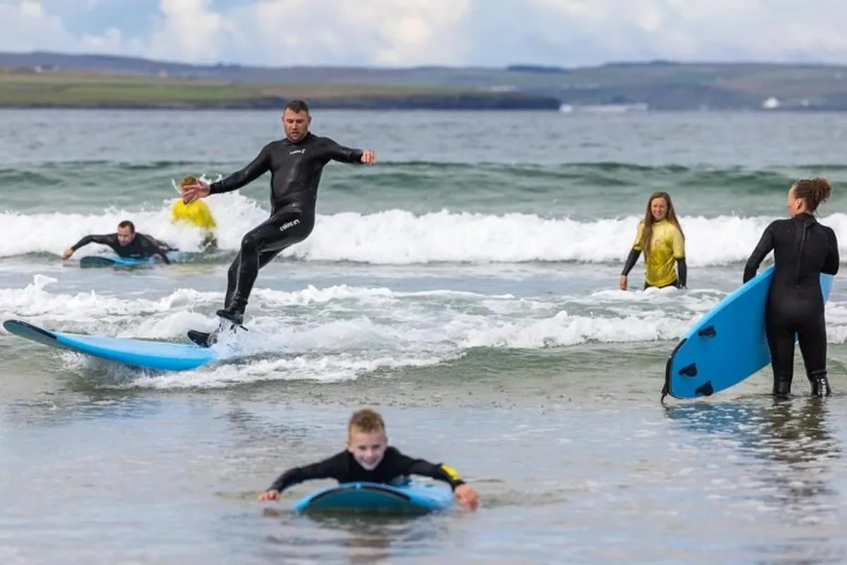 a group of people on surfboards in the ocean