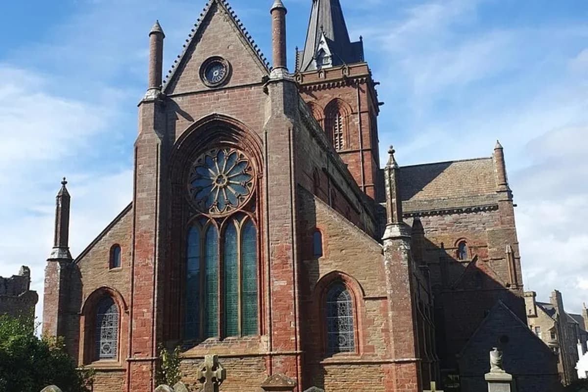a large brick church with a clock tower