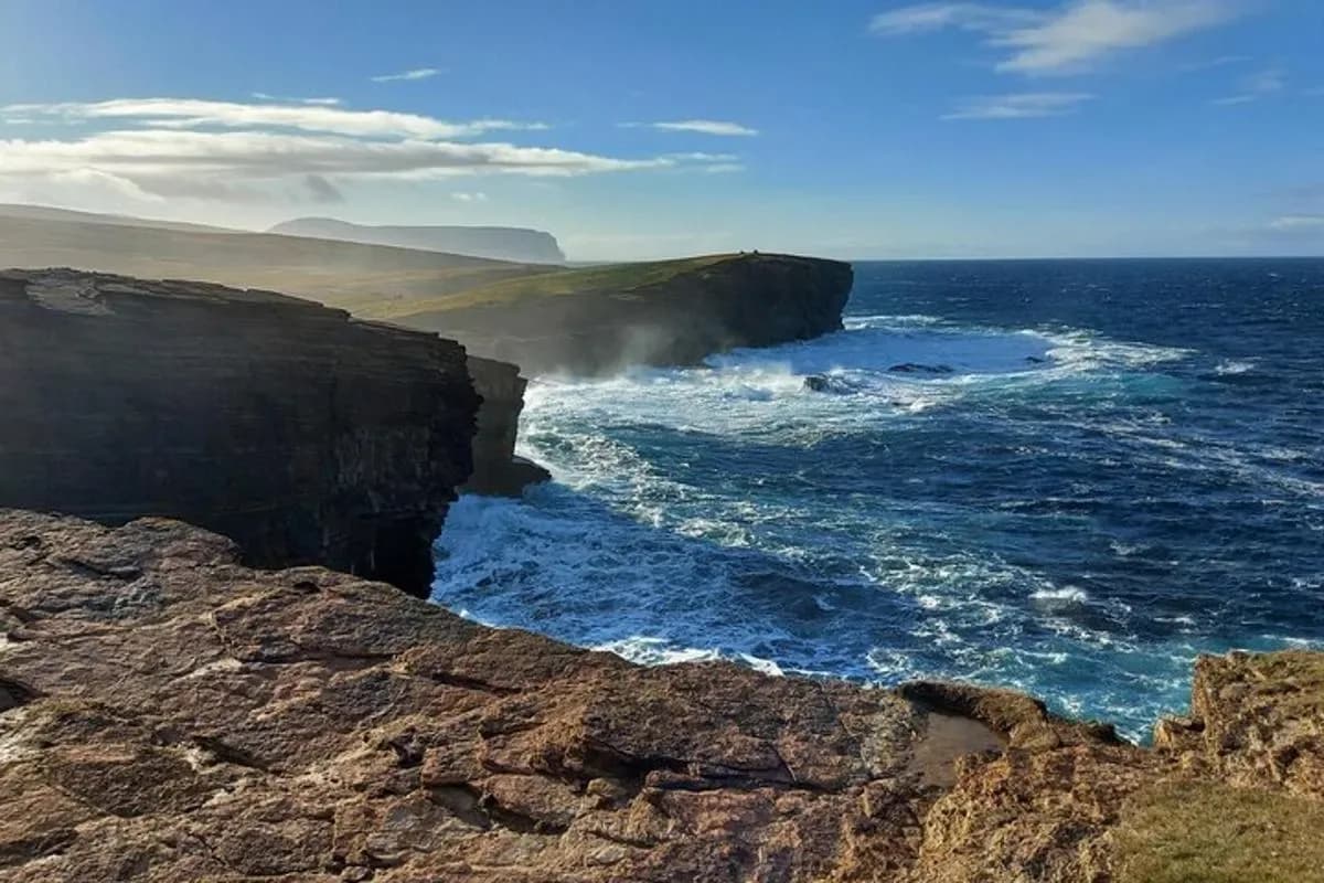 a view of the ocean from a cliff