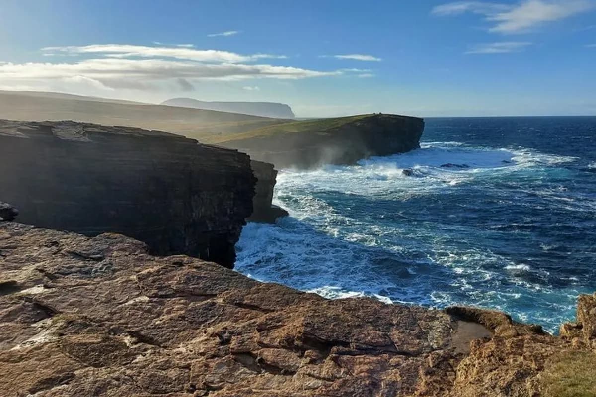 a view of the ocean from a cliff