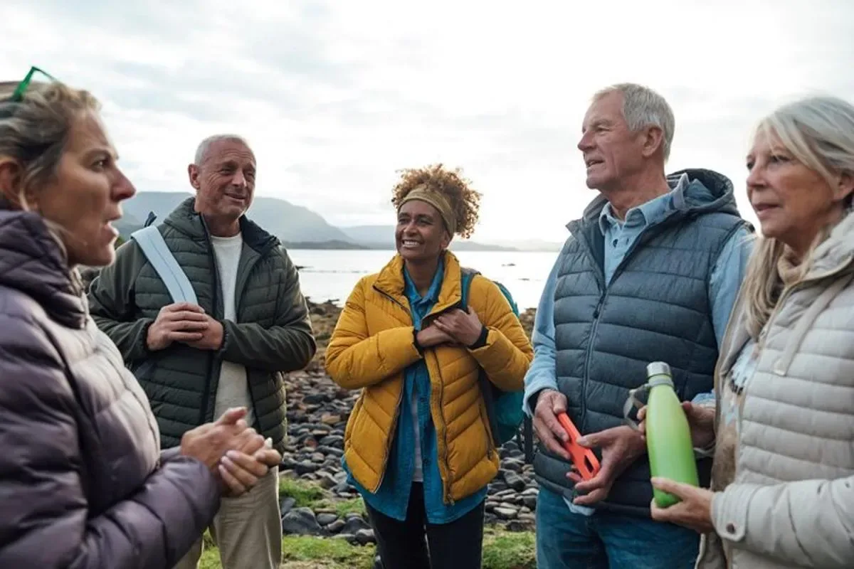 a group of people standing next to each other